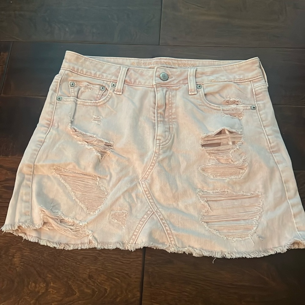 American Eagle Denim light peach distressed mini skirt size 4